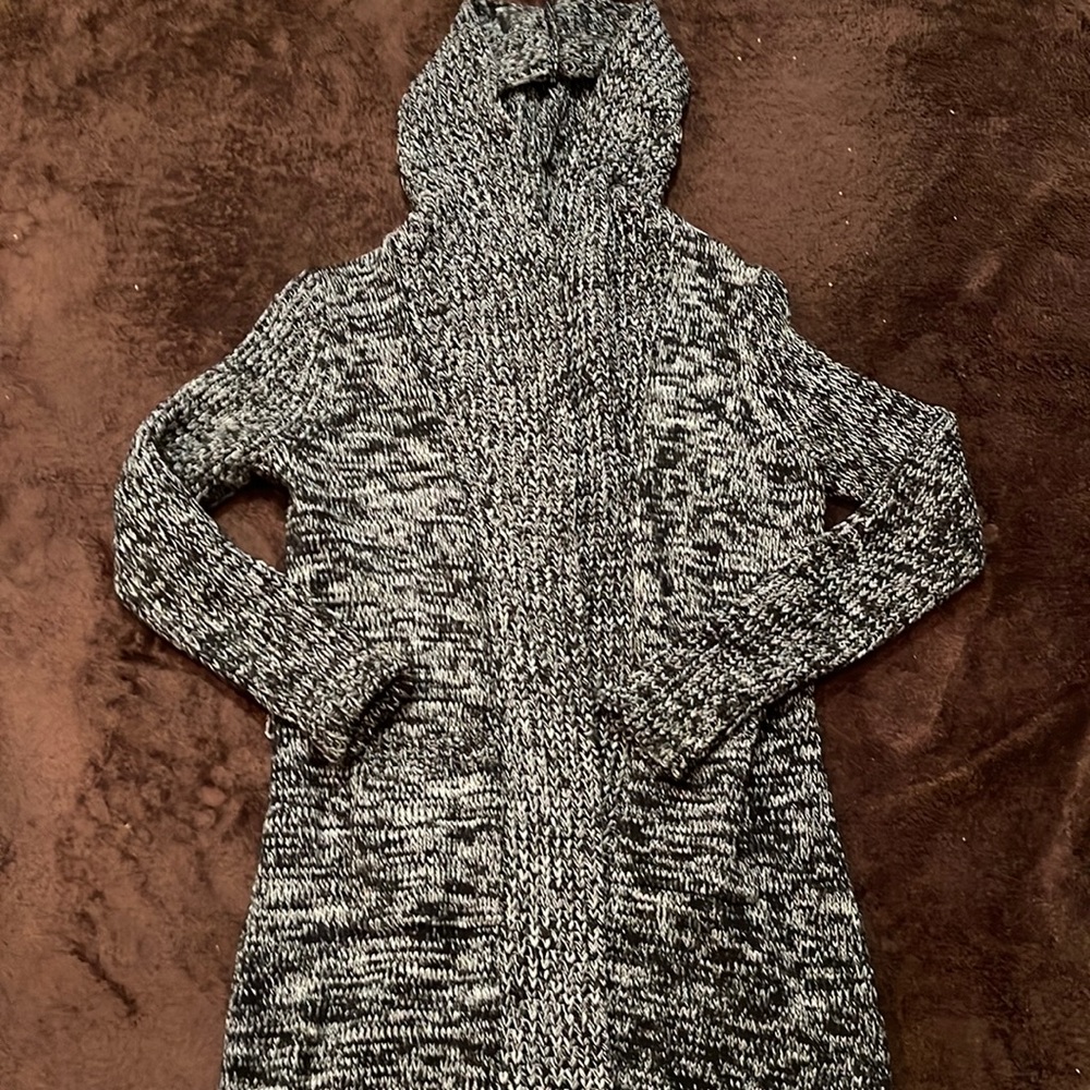 Black and white sweater coat; cotton/wool blend. Size large.